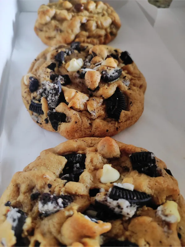 A tray of freshly baked cookies and cream cookies
